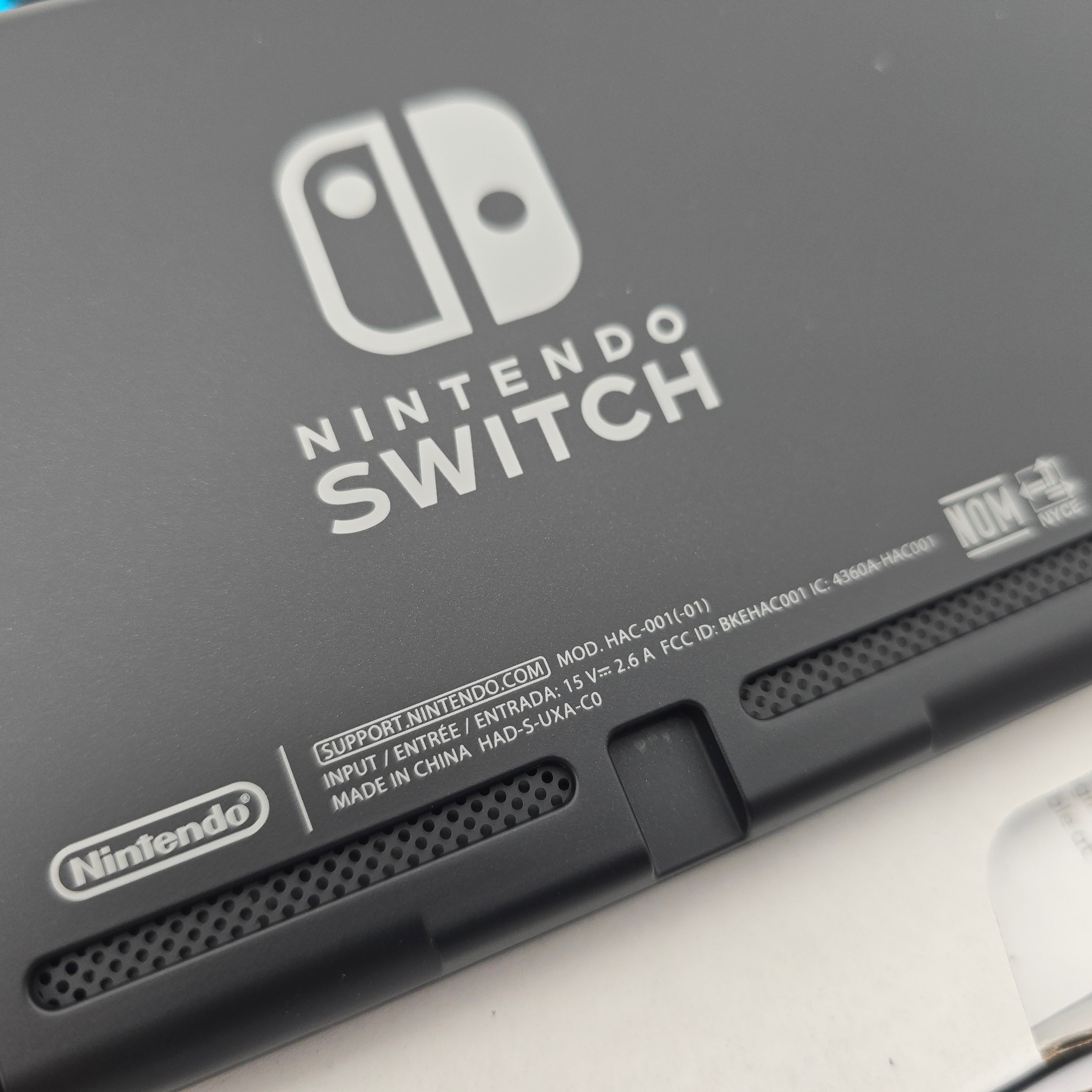 Nintendo Switch with Neon Blue and Neon Red Joy‑Con, V1 Model HAC-001, New