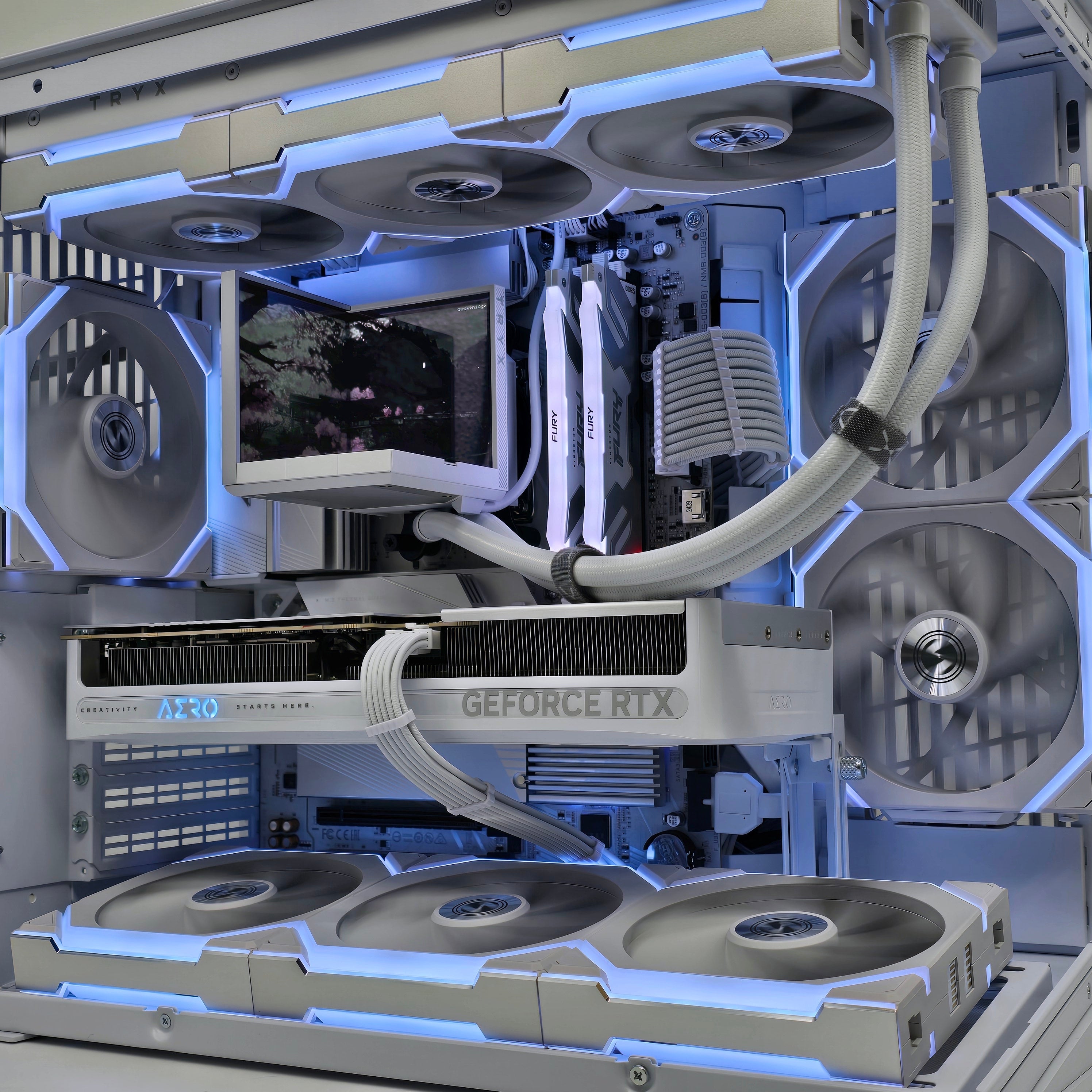RTX 5080, Ryzen 7 9800X3D, 32GB RAM, 2TB NVMe, Lian Li Mini V2 x TRYX Stage Custom White Liquid Cooled Gaming PC